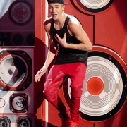 Justin Bieber performing in Los Angeles on stage with graphics and CNC routed speaker pieces by TRIO