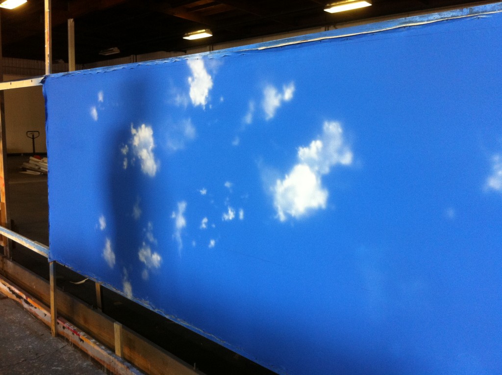 Clouds Being Hand Painted to Begin the Process