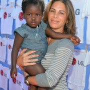 Jillian Michaels and Daughter in front of TRIO manufactured wall at LG event