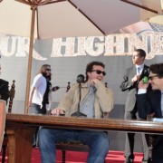 Justin Theroux, Danny McBride, and James Franco in front of TRIO's backdrop in Santa Barbara