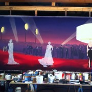 TRIO creating a hand-painted backdrop for a theatre in China