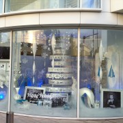 Holiday Window display at the Paley Media Center with Warner Bros, TRIO routed tree, sculpted fireplace, printed backdrop