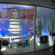 Holiday Window display at the Paley Media Center with Warner Bros, TRIO routed tree, sculpted fireplace, printed backdrop