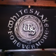 TRIO hand-painting the backdrop for Whitesnake