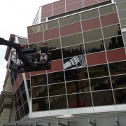 TRIO installing adhesive prints - The Voice - New York Street at Universal Studios, Hollywood