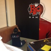 TRIO installing Riot games graphics at the USC Galen Center