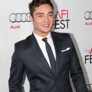 gossip girl's ed west wick in front of TRIO printed step & repeat at the J Edgar premiere