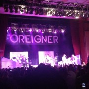TRIO printed backdrop on stage with Foreigner