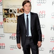 Garrett Hedlund in front of TRIO step and repeat wall at 'On the Road' premiere in Los Angeles