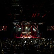 TRIO hand-painted backdrop on stage with Ronnie Dunn
