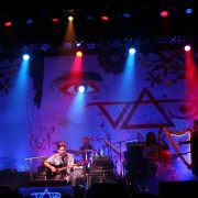 TRIO hand-painted backdrop on tour with Steve Vai